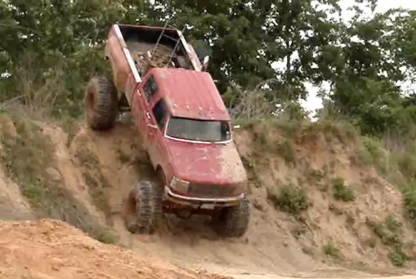 Giant Diesel Mud Truck Tackles Huge Hill