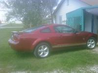 Calling owners of Candy Red Metallic mustangs!-alan-s-luckystang-2009-v6-mustang.jpg