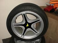 Thinking about painting my stock Starfish wheels.-black-and-gold-wheel.jpg