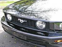 how hard is it to get the gt grille to fit my v6-fronttop.jpg