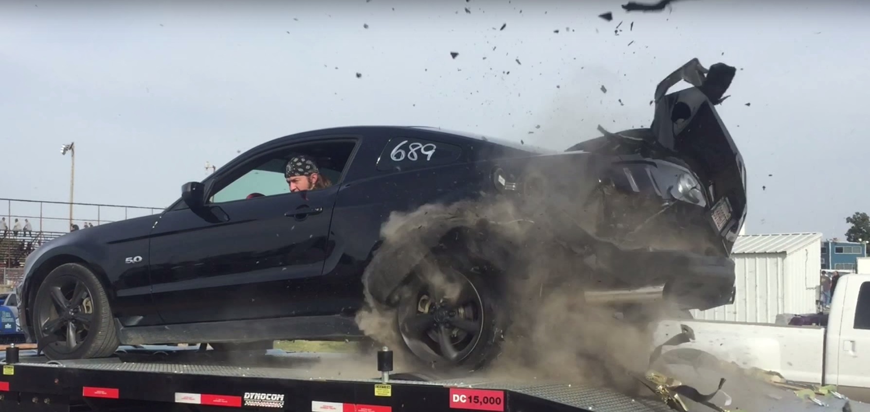 mustang-gt-blows-tire-on-dyno-at-150-mph-flying-rubber-acts-as-projectile-video-101146_1