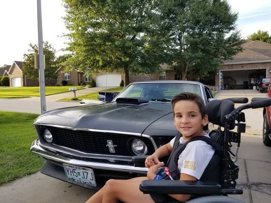 Nino Welcome and his restored Mustang Mach 1.