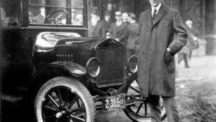 Henry Ford with a Model T, 1921.